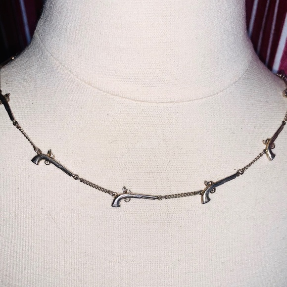 Disney 2006 Johnny Depp Pirates Pistol Necklace - Picture 1 of 5